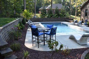 Backyard with swimming Pool, landscape and seating