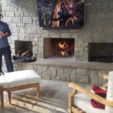 Outdoor living room with fireplace