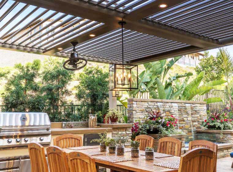 Louvered Roof over outdoor kitchen and dining area