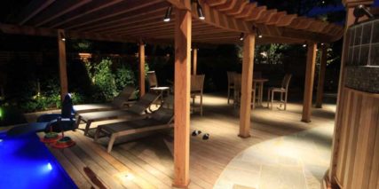 Night View of Poolside Pergola and Patio with Lighting
