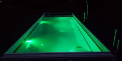 Night time view of Pool with Green LED lights