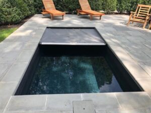 Cocktail pool with automatic pool cover
